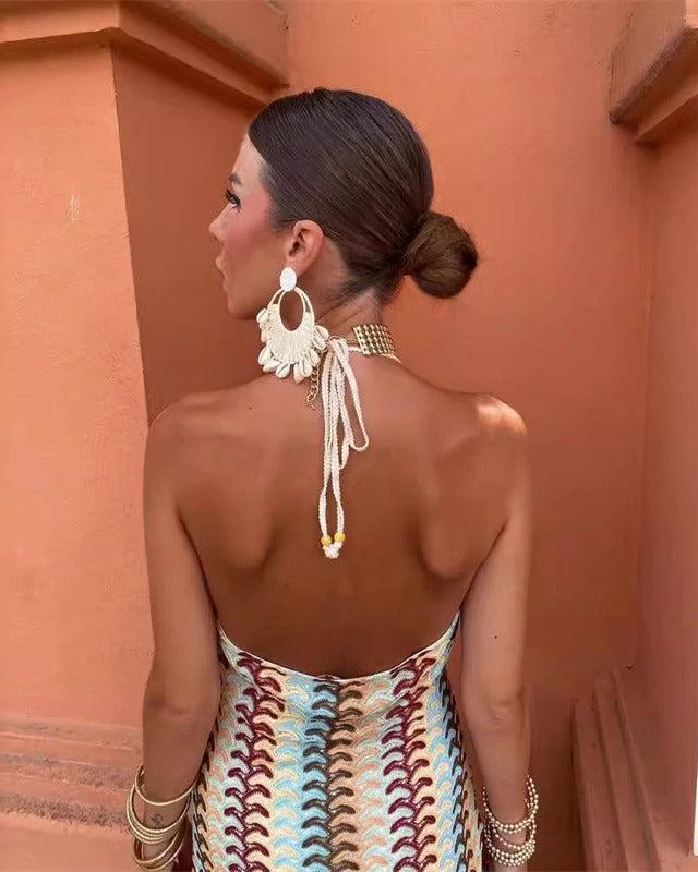 Long V-neck halter boho maxi dress with an eye-catching print, comfortable & chic for summer weddings & events.
