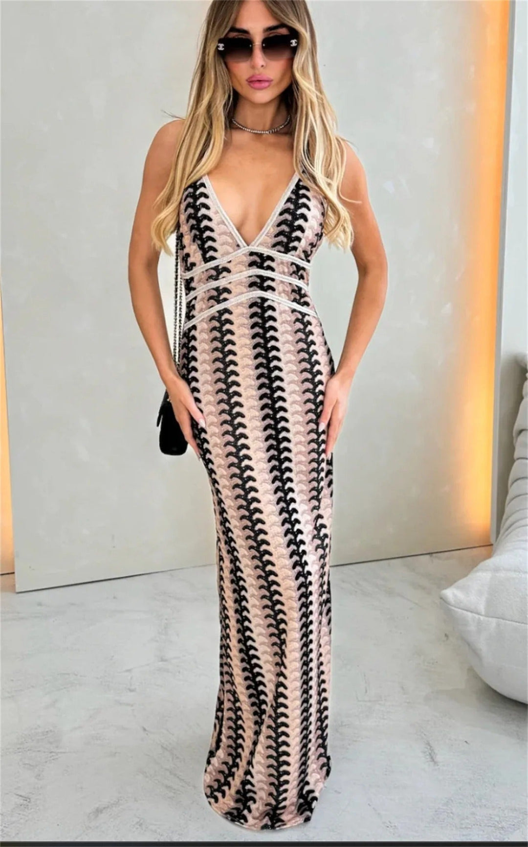 Vibrant printed V-neck halter boho maxi dress for women, an excellent vacation outfit or elegant occasion dress.