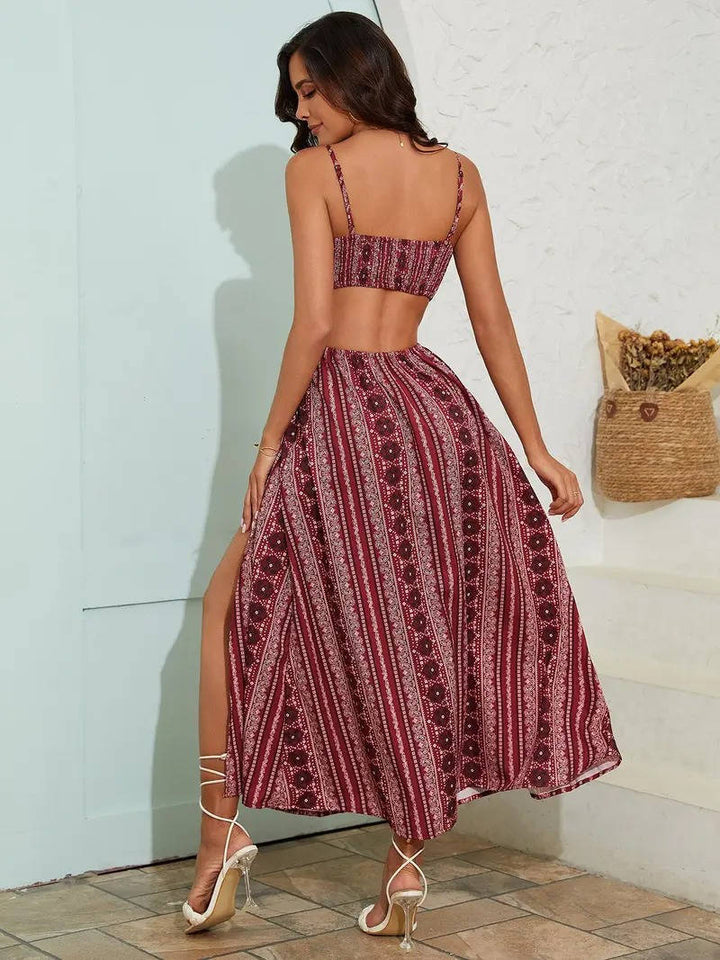 Printed women's boho maxi dress with adjustable straps, smocked back, and side slits.