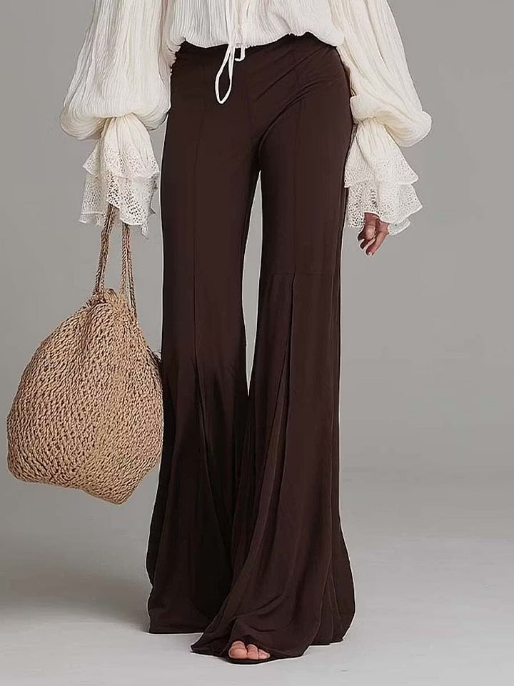 Trendy women's boho two-piece set: lace-up blouse & comfortable wide-leg flare pants, versatile for casual chic.