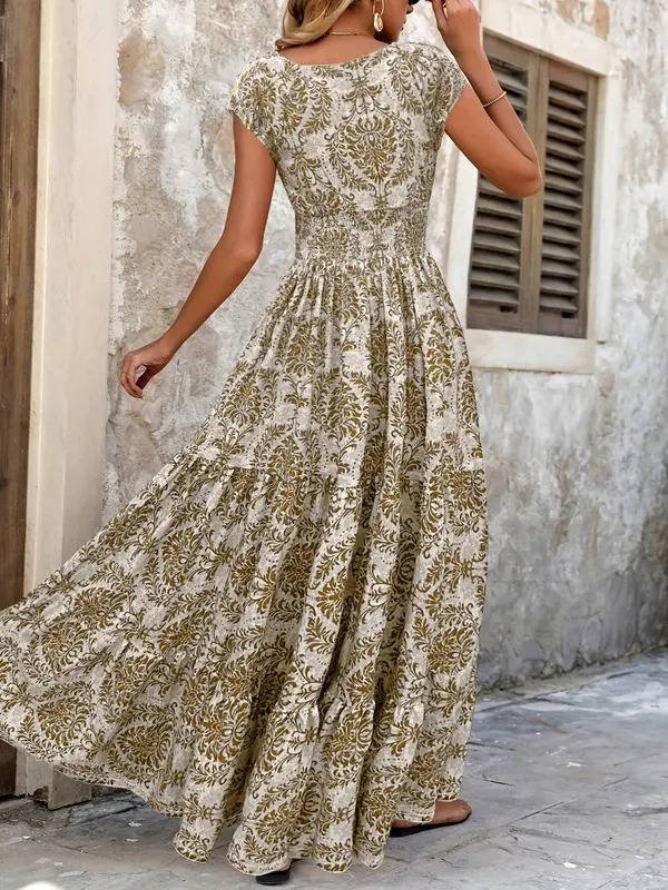 Beautiful long summer maxi dress for women. Features a flattering V-neck, flowy boho style for warm weather.