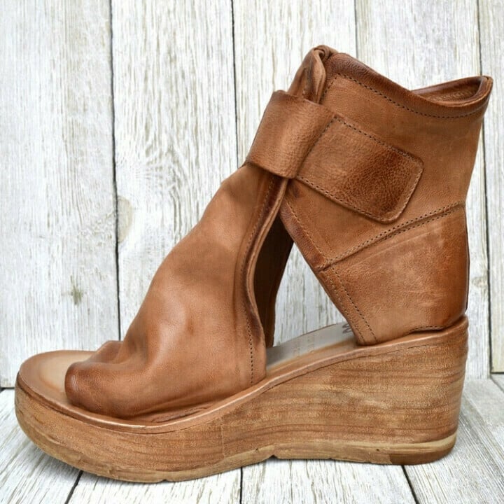 Stylish women's summer boho wedge sandals with adjustable strap, ensuring comfortable walking.