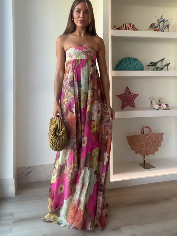 Women's bold floral strapless maxi dress, perfect for wedding guests & summer parties.