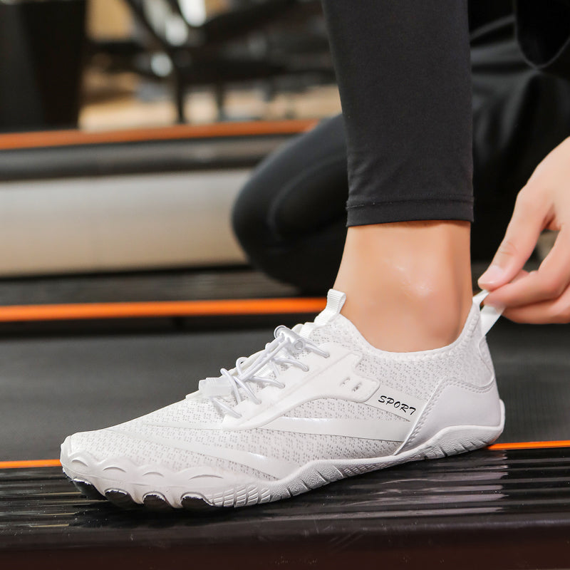 Close-up of breathable mesh on women's barefoot athletic shoes, ensures cool comfort for sport.
