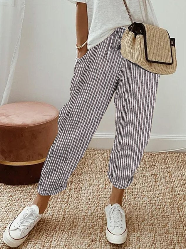 Neatly folded pair of women's breathable comfort pants, ready for travel or everyday wardrobe.