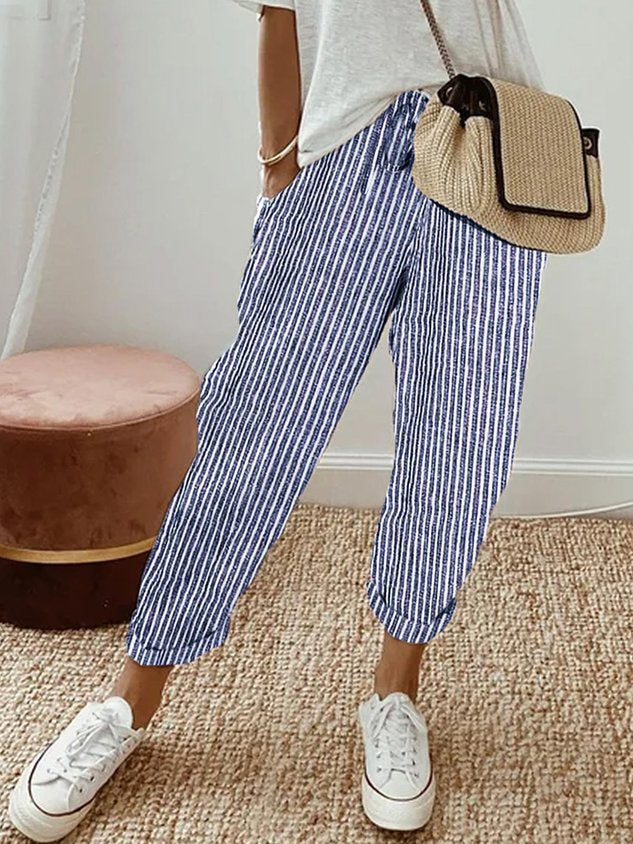 Woman styling versatile, breathable comfort pants for both casual and semi-formal looks.