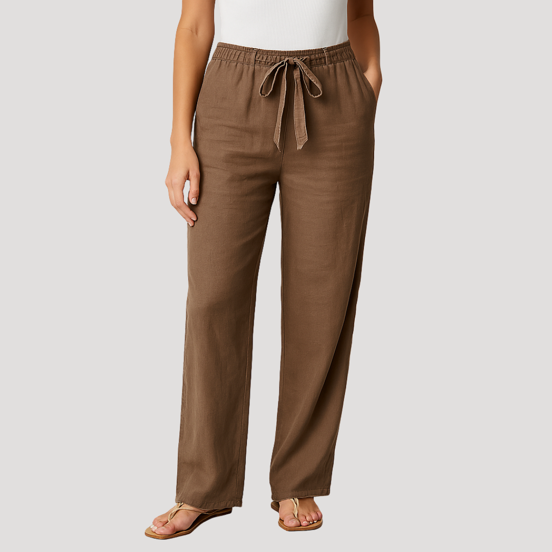 Relaxed fit women's linen trousers. Breathable straight leg pants with drawstring for ultimate summer comfort.