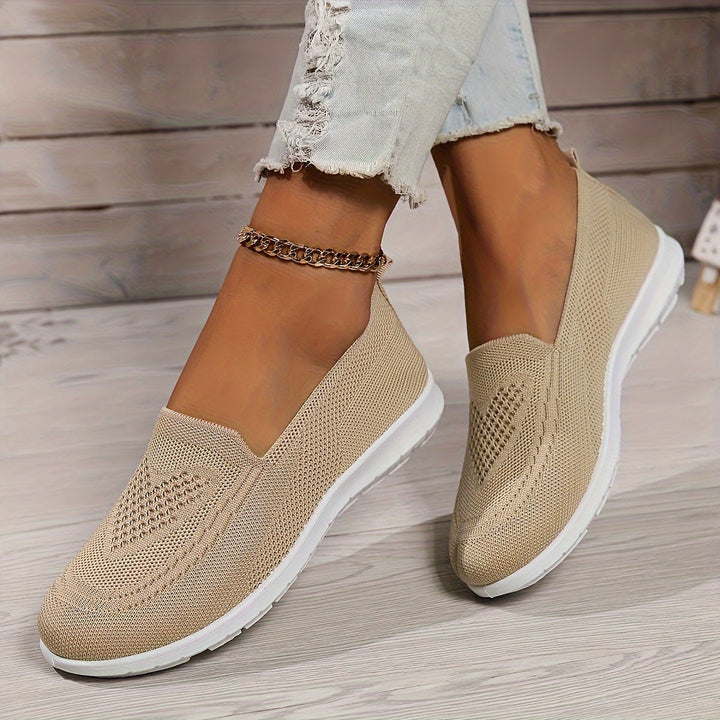 Stylish women's slip-on flatform loafers with breathable mesh knit, perfect for summer comfort.