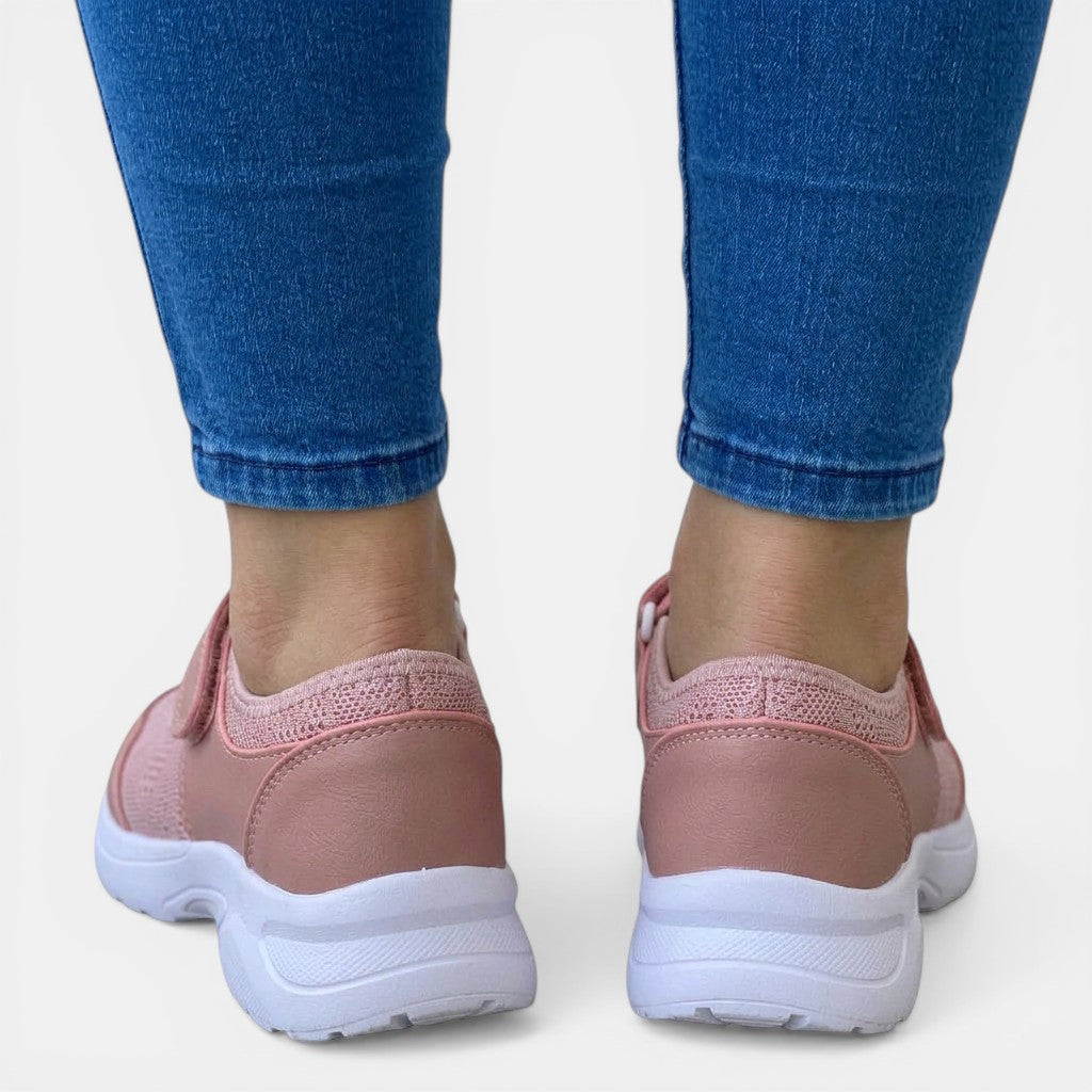 Comfortable women's orthopedic slip-on sneakers offering excellent foot support. Breathable for casual wear.