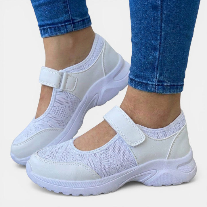 Lightweight women's slip-on walking sneakers. Breathable orthopedic design for casual comfort & support.