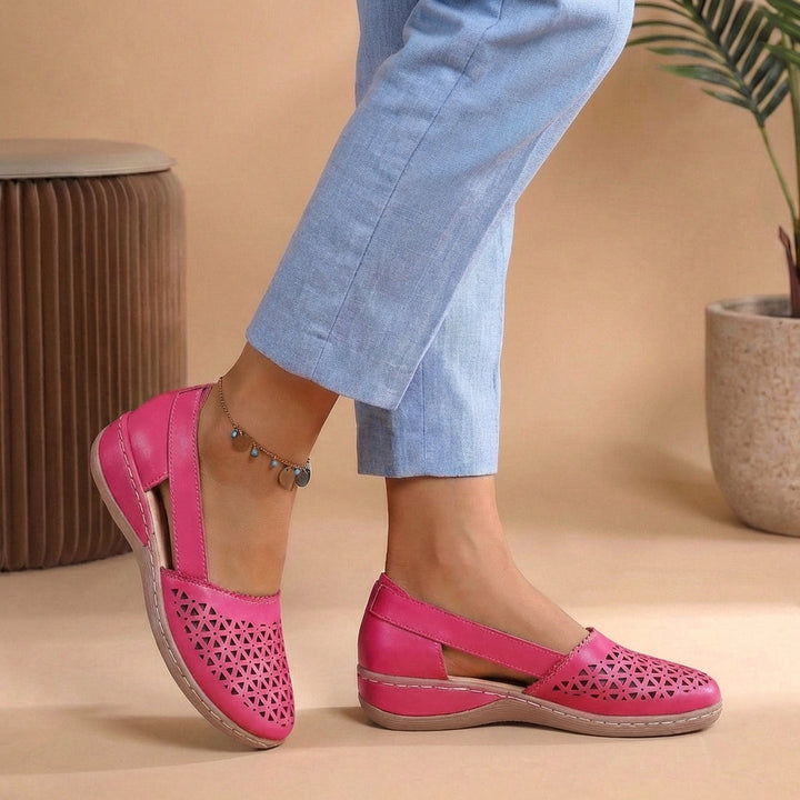 Lightweight women's slip-on comfort shoes, designed with breathable features for extended walking.