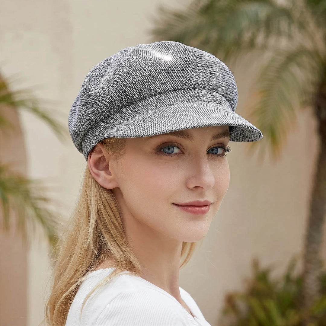 Women's breathable summer sun hat for warm days. Lightweight & stylish, perfect for beach or casual wear. UV protection.