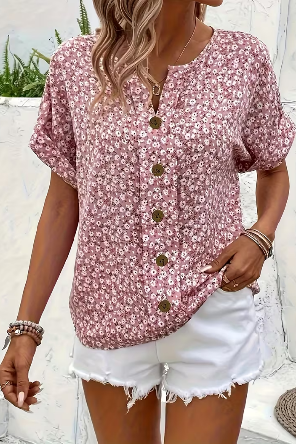 Elegant women's floral summer blouse. Short-sleeve, breezy style for comfortable, casual wear and everyday elegance.