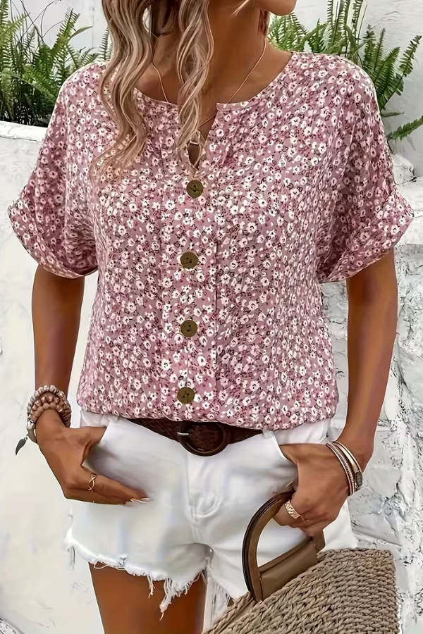 Lightweight women's floral short-sleeve blouse. Breezy summer top, perfect for casual wear and relaxed, effortless style.