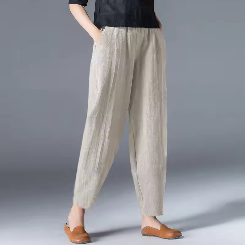 Breathable ankle-length women's trousers, relaxed fit, comfortable for beach or casual outings.