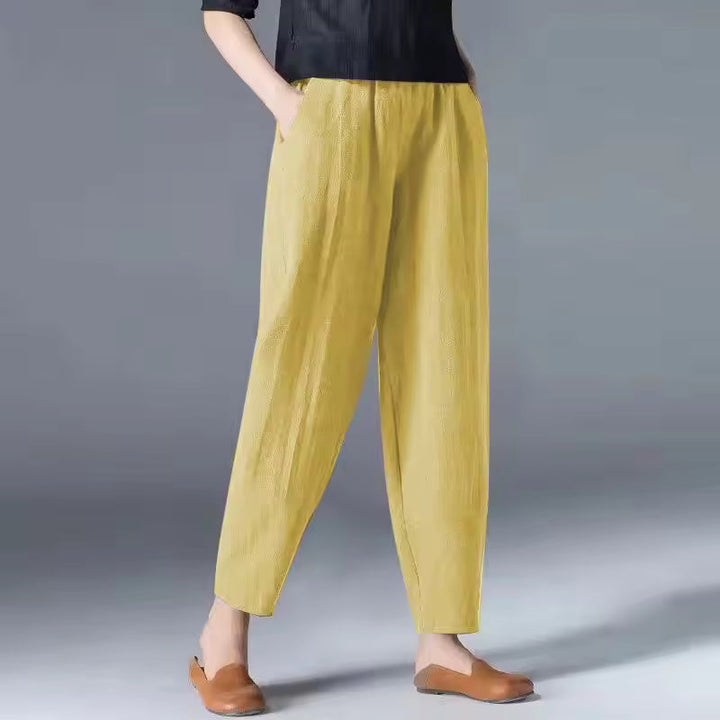 Versatile women's breezy trousers, relaxed fit, breathable, great for travel & everyday wear.