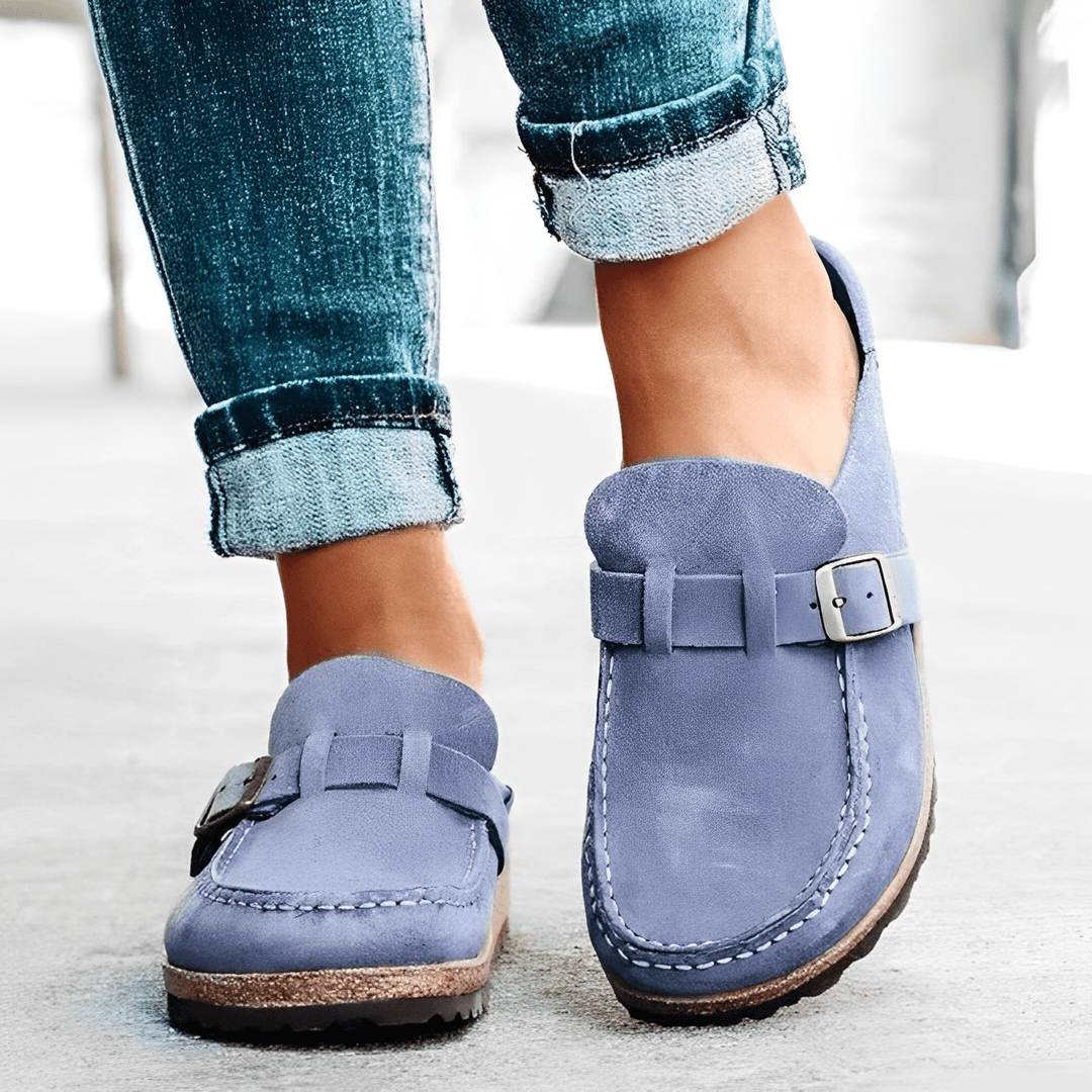 Supreme comfort women's Brynn orthopedic mules. Slip-on style with arch support, perfect for relaxed wear.