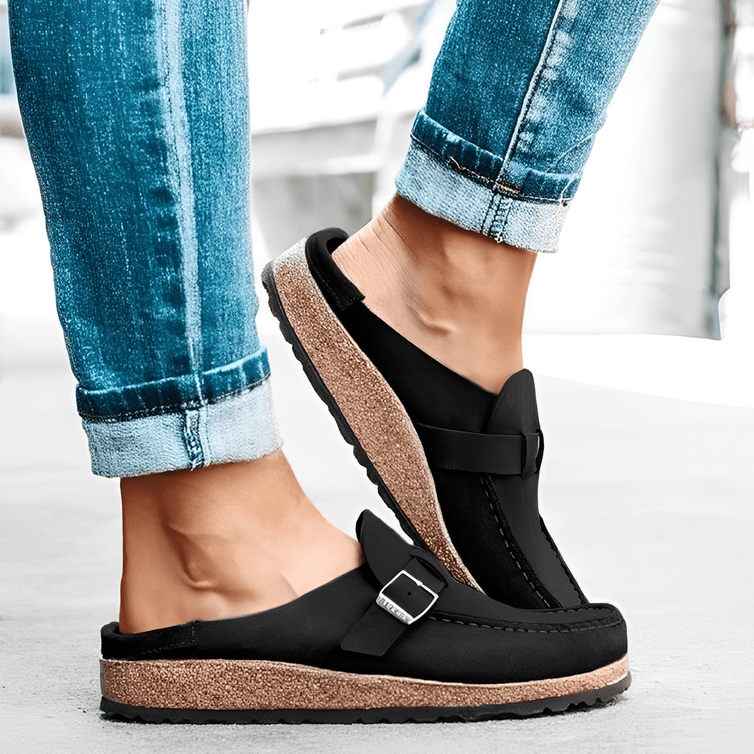 Women's Brynn orthopedic slip-on mules. Cushioned, arch support for comfortable everyday wear.