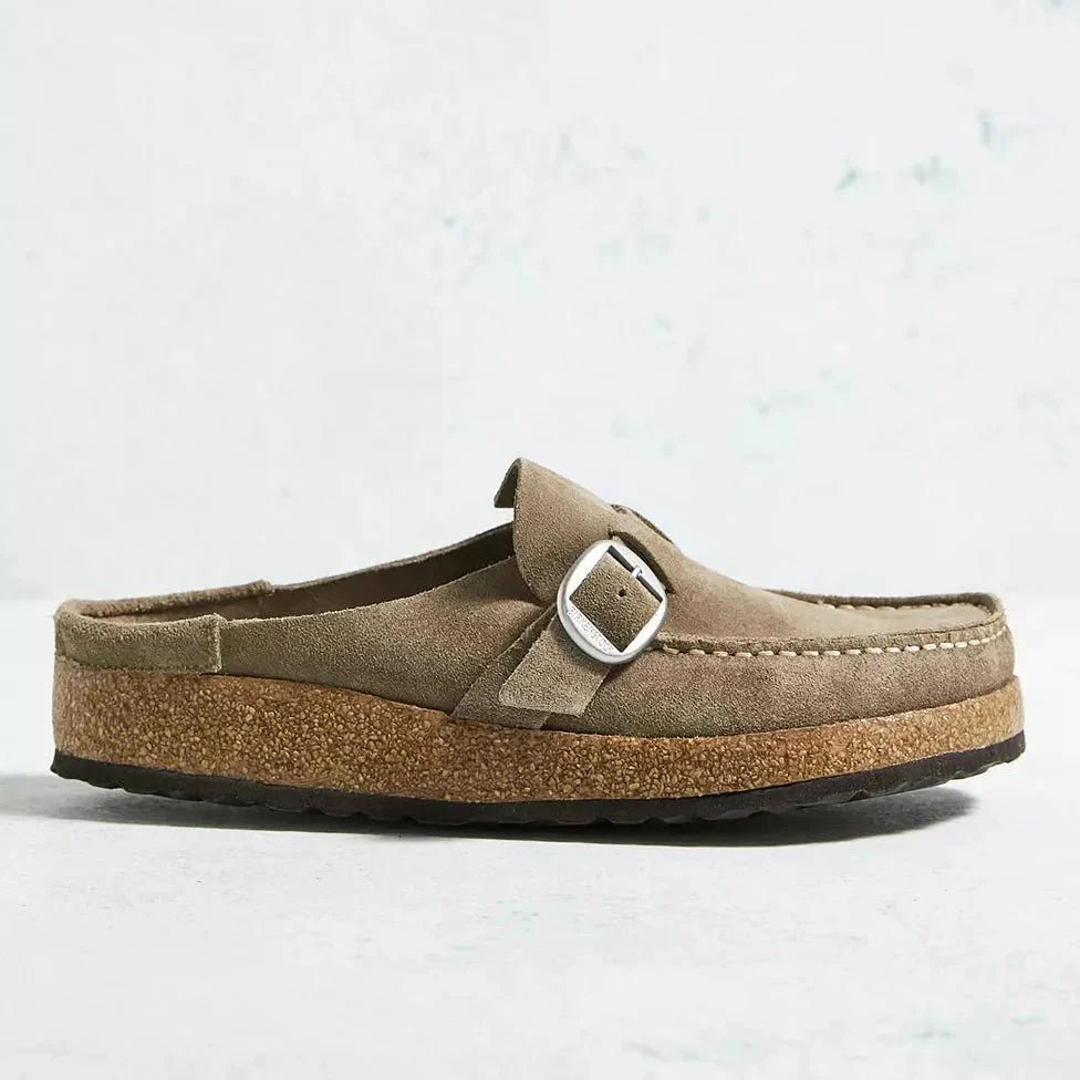Orthopedic women's Brynn mules for ultimate comfort. Slip-on design with arch support for daily relief.