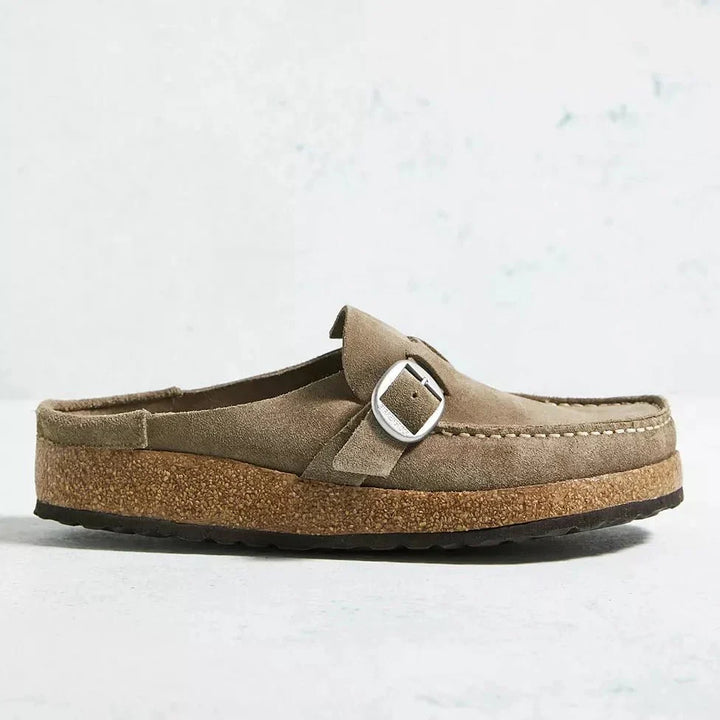 Orthopedic women's Brynn mules for ultimate comfort. Slip-on design with arch support for daily relief.