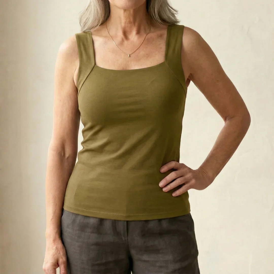 Supportive women's tank top with built-in bra, wire-free comfort for casual and active wear.