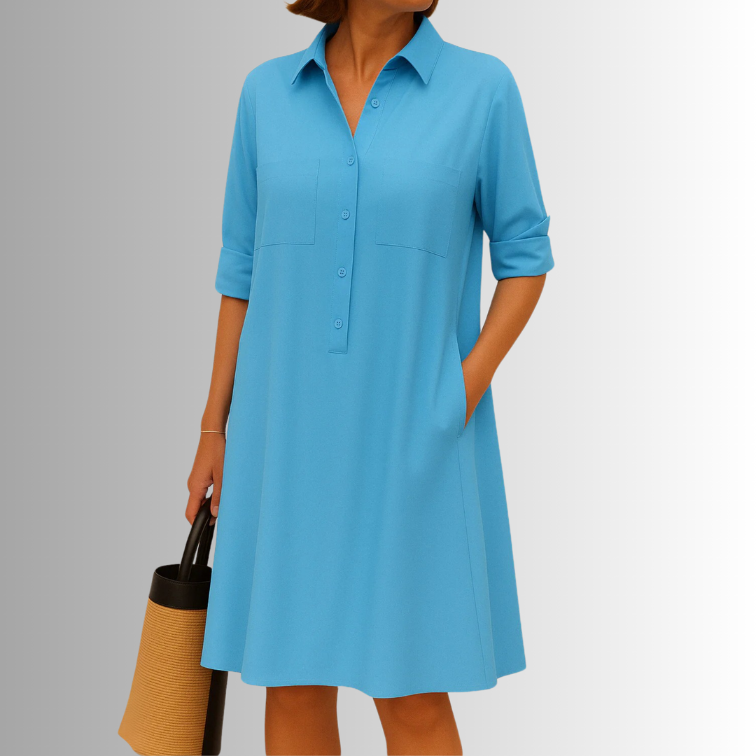 Casual & elegant women's button-down A-line dress with short sleeves, collared neckline, and pockets.