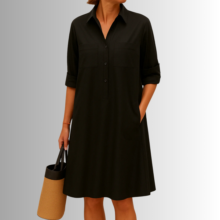 Chic women's A-line button-down dress with a flattering silhouette, short sleeves, collar, and side pockets.