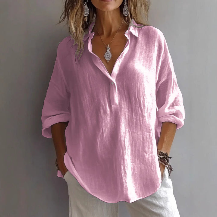 Stylish women's wide-sleeve button-down shirt, a chic and versatile option for everyday wear.