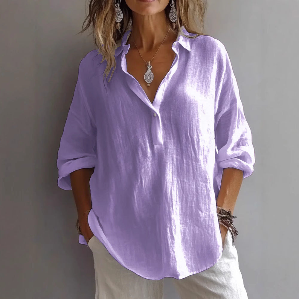 Fashionable women's wide-sleeve button-down top, offering chic comfort for any occasion.