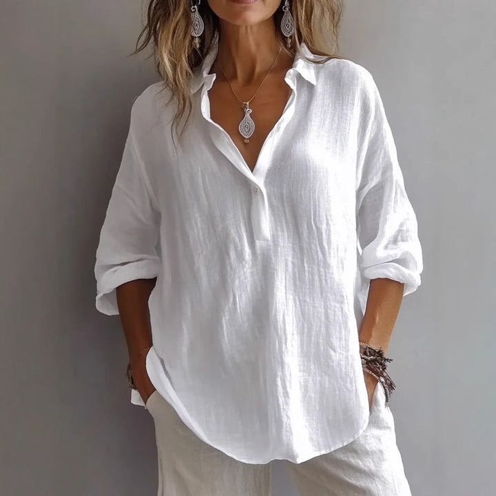 Summer-ready women's button-down shirt with elegant wide sleeves, a must-have blouse.