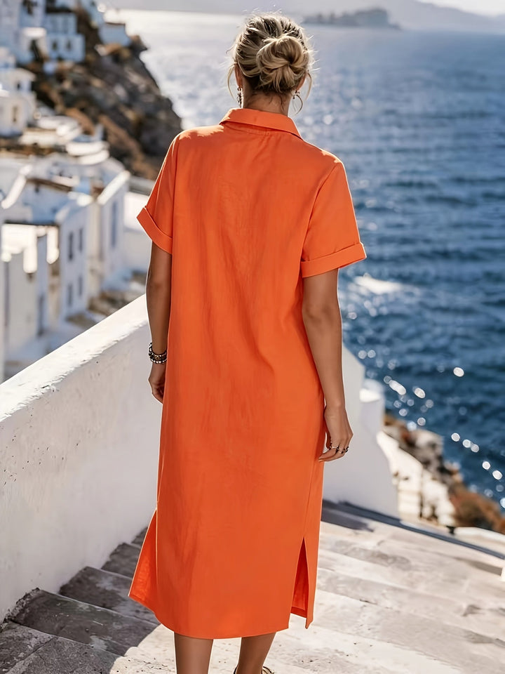 Essential women's summer vacation dress, short sleeve button-front midi style.