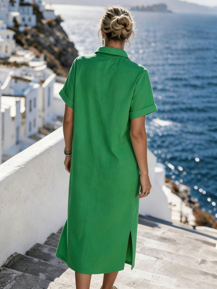 Relaxed fit women's shirt dress, short sleeve button-front, ideal for beach or city trips.