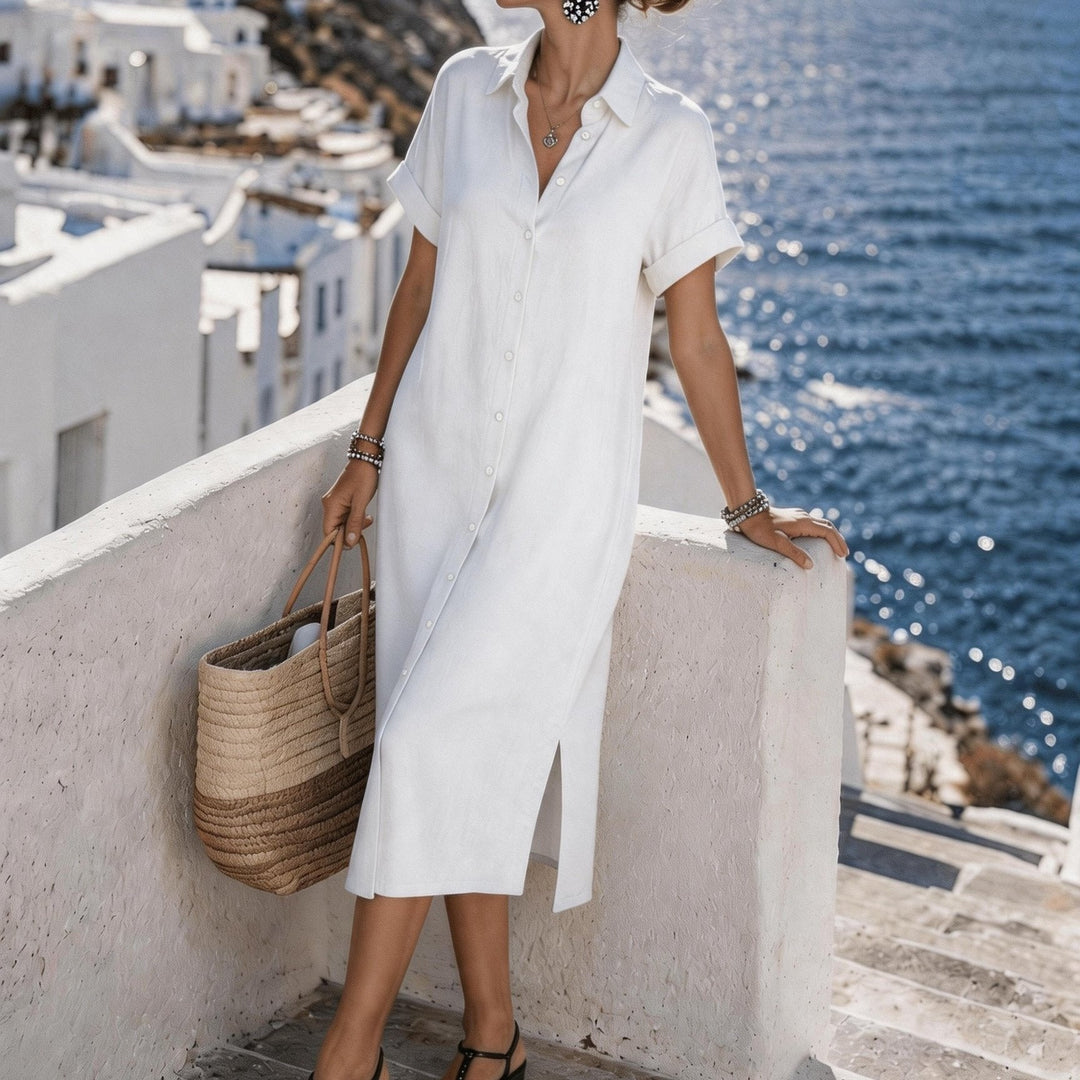 Elegant women's short sleeve shirt dress with buttons, suitable for travel and vacation.