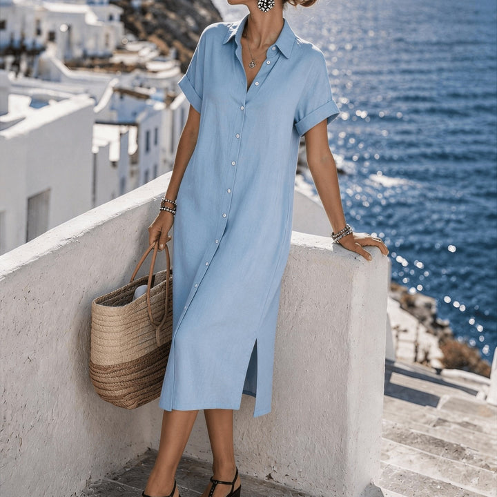 Women's button-front collared midi dress, short sleeve design for a classic summer outfit.