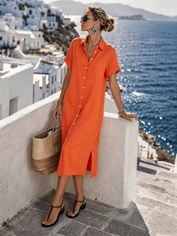 Comfortable women's summer midi dress, featuring short sleeves and a chic button front.