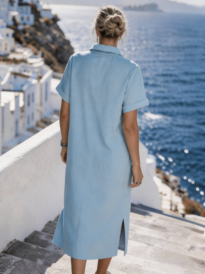 Chic women's short sleeve midi dress, button-front design for a relaxed summer look.