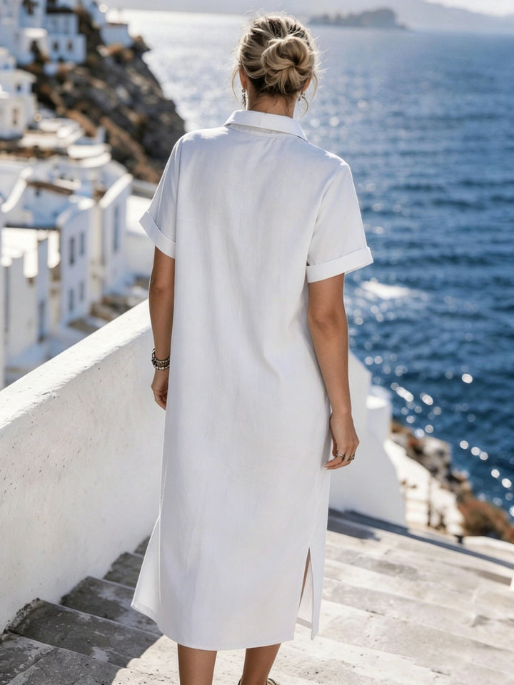 Women's collared casual dress, short sleeve and button-front, perfect for warm weather.