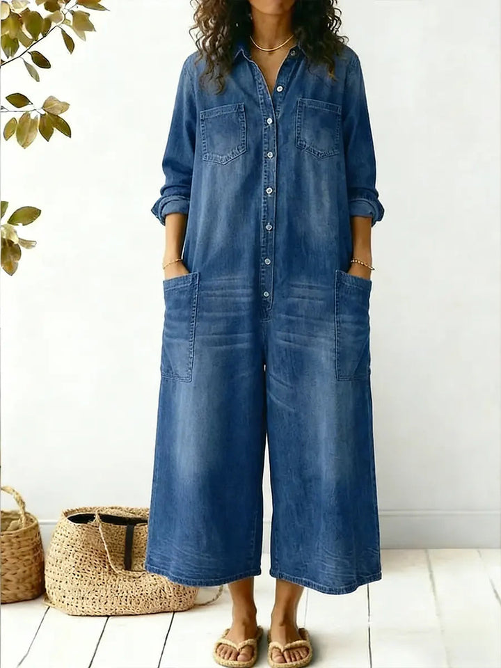 Comfortable women's wide leg jumpsuit with button-up front, long sleeves, & pockets. Versatile style.