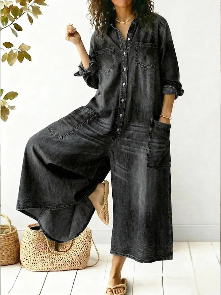 Relaxed fit women's wide leg jumpsuit, button-up, collared, long sleeves. Ideal for stylish comfort.
