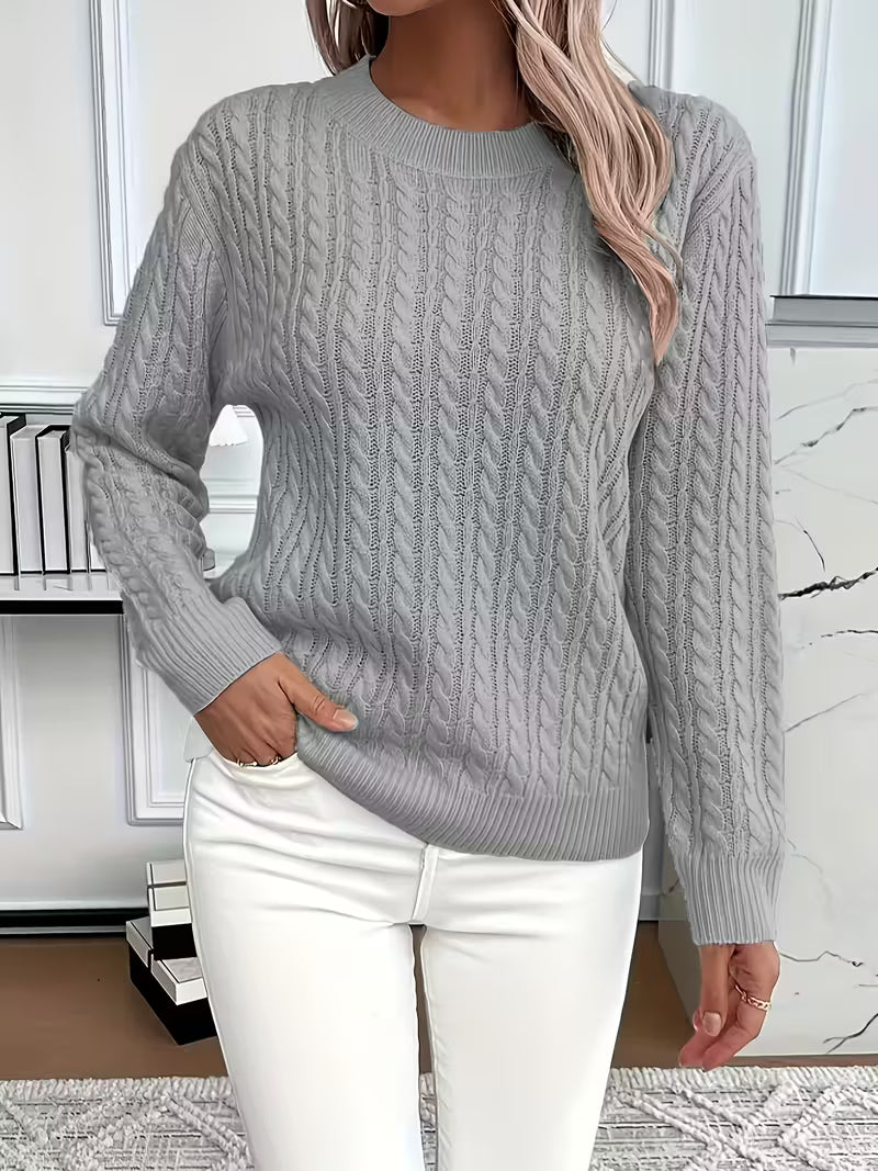 Stylish women's cable knit crew neck jumper, easily transitions from casual to smart autumn looks.