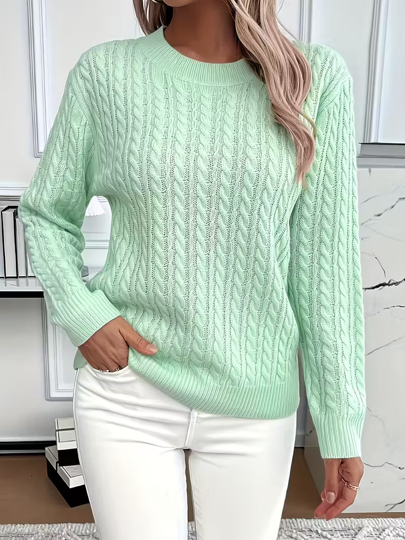 Effortless autumn style: women's long-sleeve cable knit crew neck sweater for versatile casual wear.
