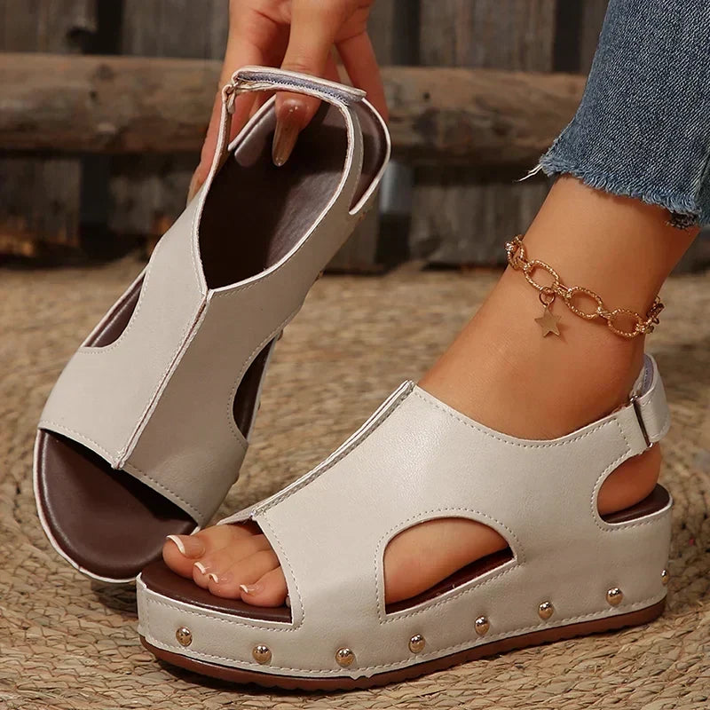 Fashionable women's Camellia platform sandals in beige, featuring a comfortable design for stylish casual wear.