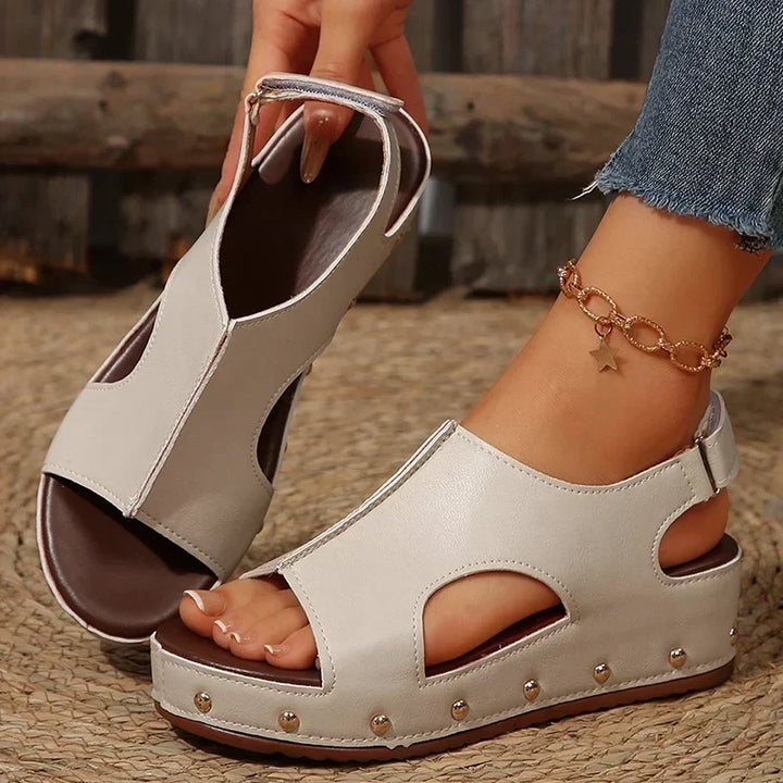 Fashionable women's Camellia platform sandals in beige, featuring a comfortable design for stylish casual wear.