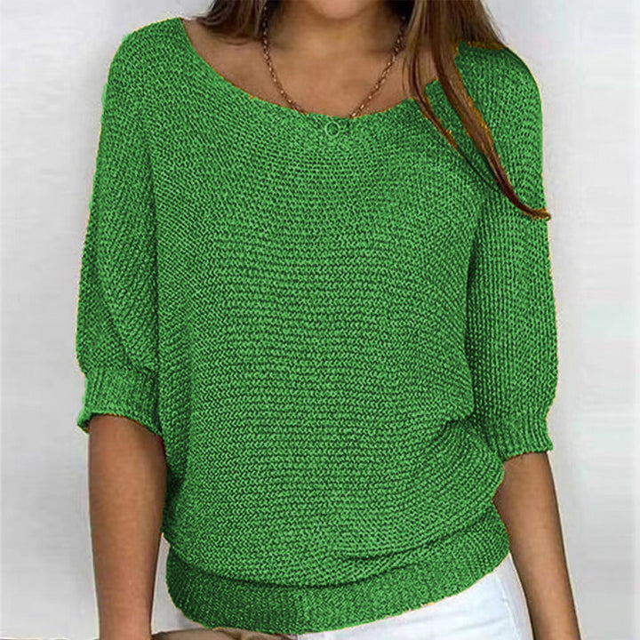 Close-up of Carla women's ultra-soft comfort knit sweater texture. Cozy pullover for warm fall and winter fashion.