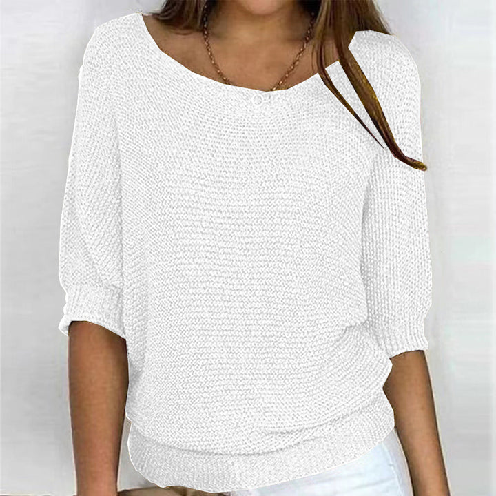 Folded women's Carla ultra-soft comfort knit sweater. A versatile long sleeve pullover, perfect for fall fashion.