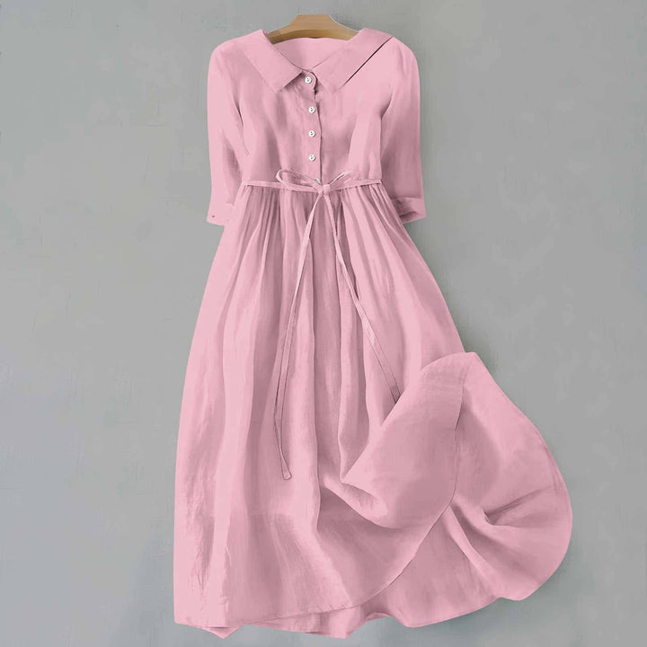 Relaxed fit women's short sleeve A-line midi dress, a versatile casual summer dress for everyday wear.
