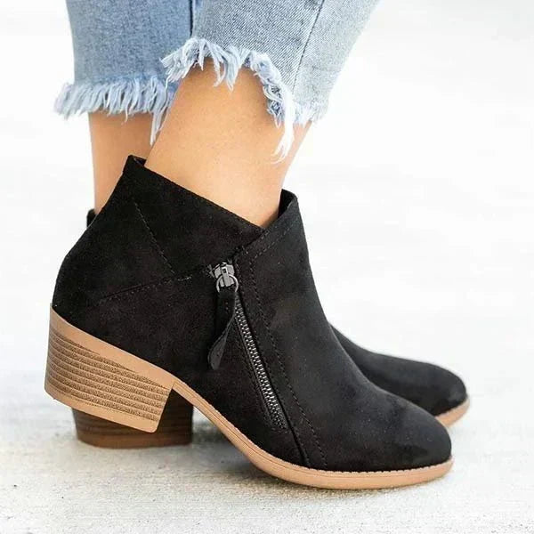 Comfortable beige block heel ankle boots for women, featuring a convenient side zip, ideal for fall footwear.