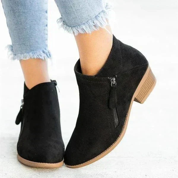 Durable orange women's casual ankle boots with side zip and comfortable block heel, great for fall fashion.