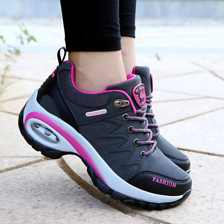 Stylish slip-on women's sneakers with arch support & breathable upper for foot comfort.