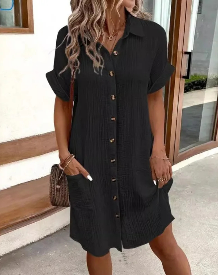 Relaxed fit women's casual mini shirt dress with a button-down front and collar, ideal for comfortable spring/summer style.